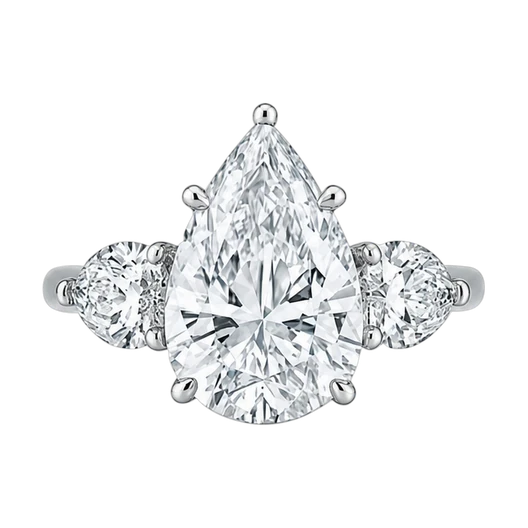 Pear-cut diamond ring with round diamond shoulders, in white gold